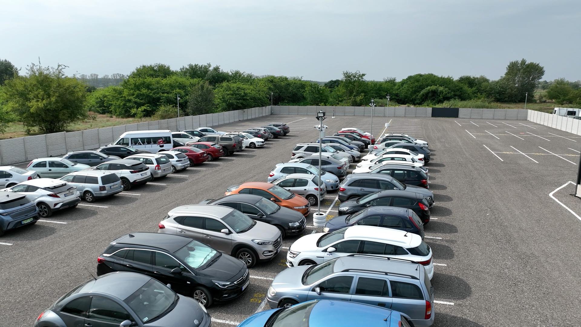 Image of the parking lot at half load